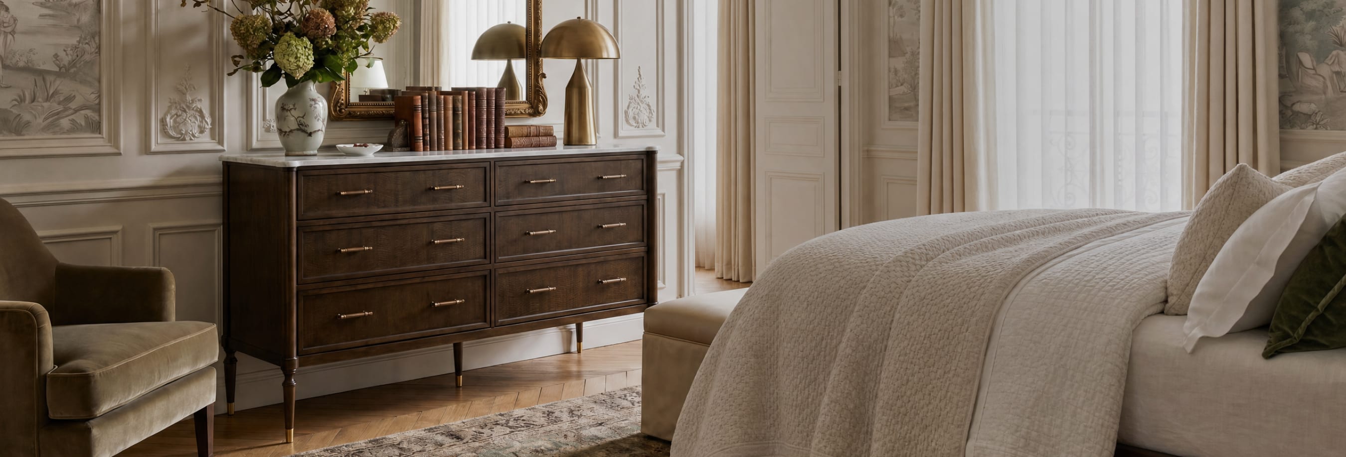 A refined bedroom featuring a dark wood dresser